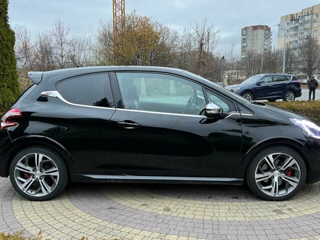 Черный Пежо 208, объемом двигателя 1.6 л и пробегом 130 тыс. км за 13650 $, фото 7 на Automoto.ua