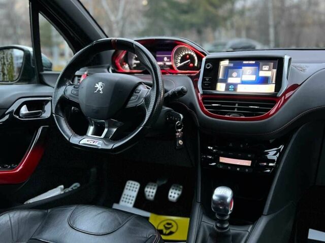 Черный Пежо 208, объемом двигателя 1.6 л и пробегом 130 тыс. км за 13650 $, фото 19 на Automoto.ua