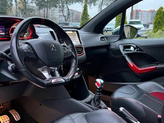 Черный Пежо 208, объемом двигателя 1.6 л и пробегом 130 тыс. км за 13650 $, фото 9 на Automoto.ua