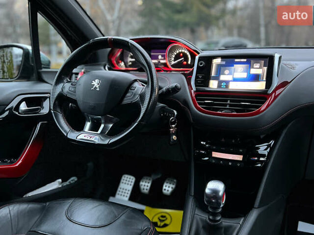 Черный Пежо 208, объемом двигателя 1.6 л и пробегом 130 тыс. км за 13650 $, фото 19 на Automoto.ua