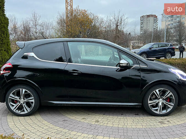 Черный Пежо 208, объемом двигателя 1.6 л и пробегом 130 тыс. км за 13650 $, фото 7 на Automoto.ua