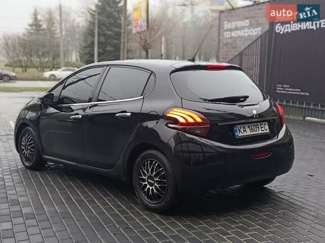 Черный Пежо 208, объемом двигателя 1.2 л и пробегом 181 тыс. км за 5750 $, фото 4 на Automoto.ua