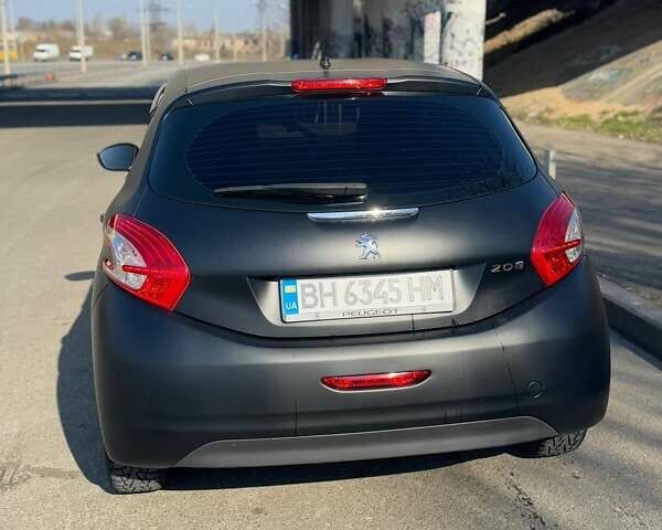 Черный Пежо 208, объемом двигателя 1.6 л и пробегом 123 тыс. км за 7200 $, фото 2 на Automoto.ua