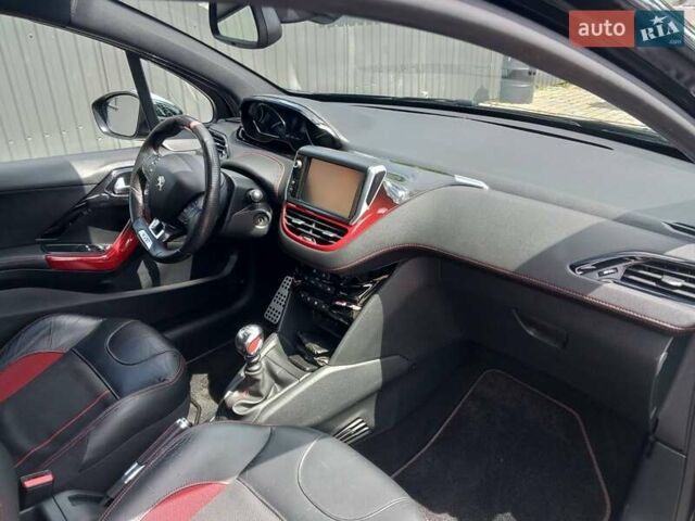 Чорний Пежо 208, об'ємом двигуна 1.6 л та пробігом 130 тис. км за 13000 $, фото 4 на Automoto.ua