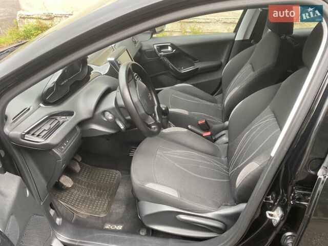 Черный Пежо 208, объемом двигателя 1.56 л и пробегом 214 тыс. км за 8250 $, фото 9 на Automoto.ua