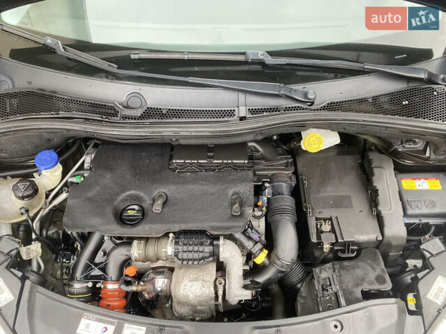 Черный Пежо 208, объемом двигателя 1.56 л и пробегом 214 тыс. км за 8250 $, фото 18 на Automoto.ua