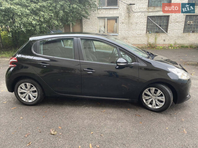 Черный Пежо 208, объемом двигателя 1.56 л и пробегом 214 тыс. км за 8250 $, фото 3 на Automoto.ua