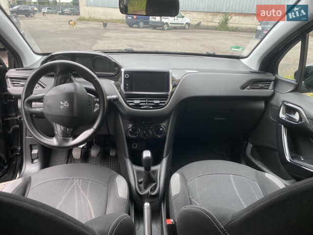Черный Пежо 208, объемом двигателя 1.56 л и пробегом 214 тыс. км за 8250 $, фото 11 на Automoto.ua