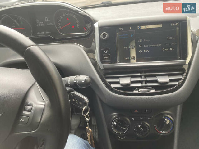 Черный Пежо 208, объемом двигателя 1.56 л и пробегом 214 тыс. км за 8250 $, фото 21 на Automoto.ua