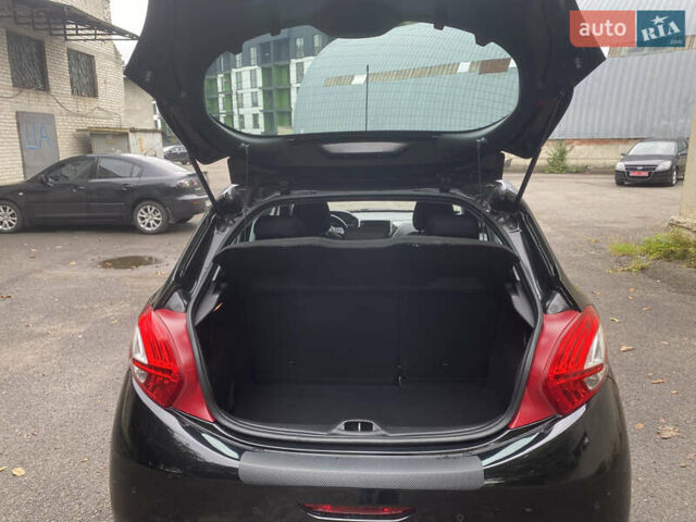 Черный Пежо 208, объемом двигателя 1.56 л и пробегом 214 тыс. км за 8250 $, фото 15 на Automoto.ua