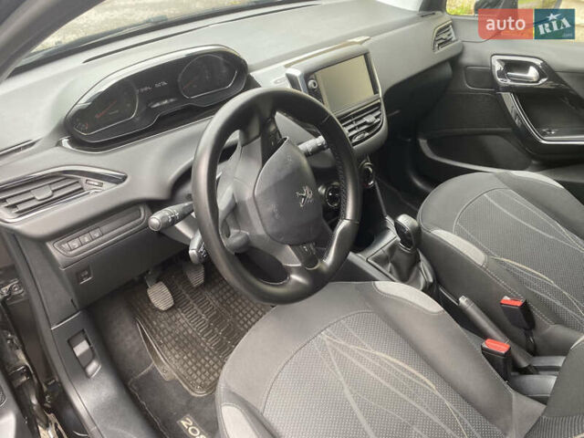 Черный Пежо 208, объемом двигателя 1.56 л и пробегом 214 тыс. км за 8250 $, фото 10 на Automoto.ua