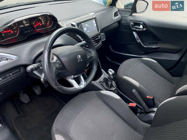 Черный Пежо 208, объемом двигателя 1.2 л и пробегом 117 тыс. км за 6900 $, фото 15 на Automoto.ua