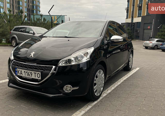 Черный Пежо 208, объемом двигателя 1.2 л и пробегом 117 тыс. км за 6900 $, фото 2 на Automoto.ua