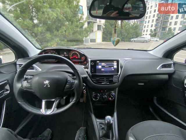 Черный Пежо 208, объемом двигателя 1.2 л и пробегом 117 тыс. км за 6900 $, фото 17 на Automoto.ua