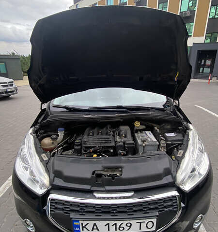 Черный Пежо 208, объемом двигателя 1.2 л и пробегом 117 тыс. км за 6900 $, фото 16 на Automoto.ua