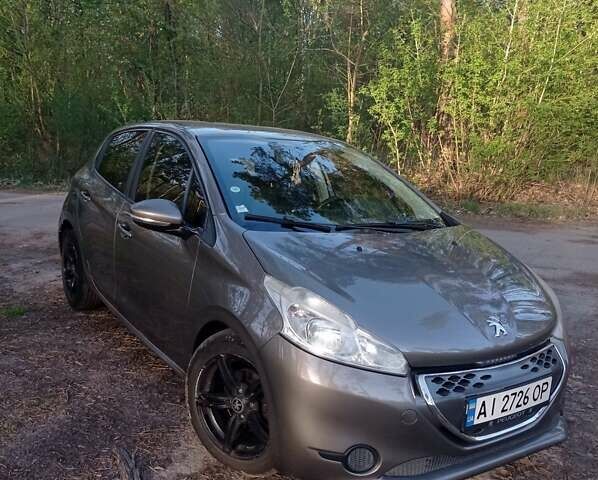 Коричневий Пежо 208, об'ємом двигуна 1.4 л та пробігом 218 тис. км за 6600 $, фото 3 на Automoto.ua