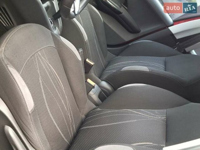 Червоний Пежо 208, об'ємом двигуна 1.2 л та пробігом 129 тис. км за 6900 $, фото 13 на Automoto.ua