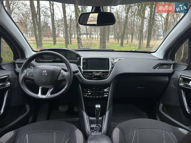 Красный Пежо 208, объемом двигателя 1.6 л и пробегом 232 тыс. км за 7999 $, фото 25 на Automoto.ua