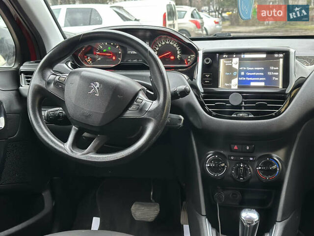 Красный Пежо 208, объемом двигателя 1.2 л и пробегом 177 тыс. км за 5500 $, фото 10 на Automoto.ua