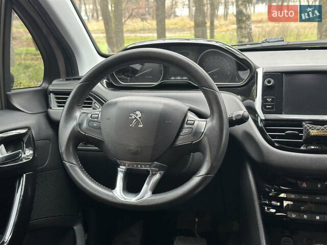 Красный Пежо 208, объемом двигателя 1.6 л и пробегом 232 тыс. км за 7999 $, фото 26 на Automoto.ua
