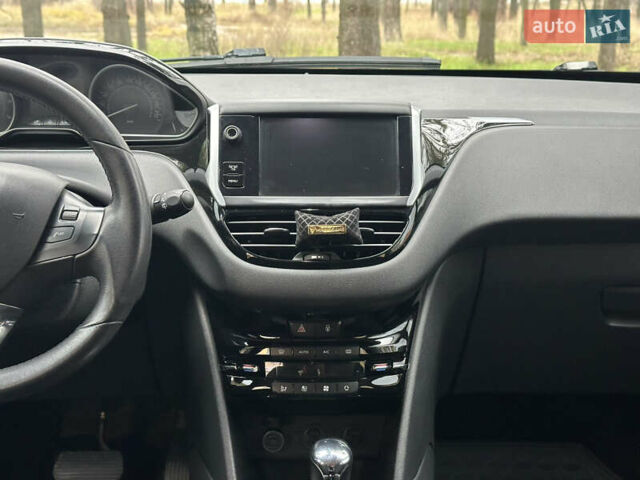 Красный Пежо 208, объемом двигателя 1.6 л и пробегом 232 тыс. км за 7999 $, фото 27 на Automoto.ua