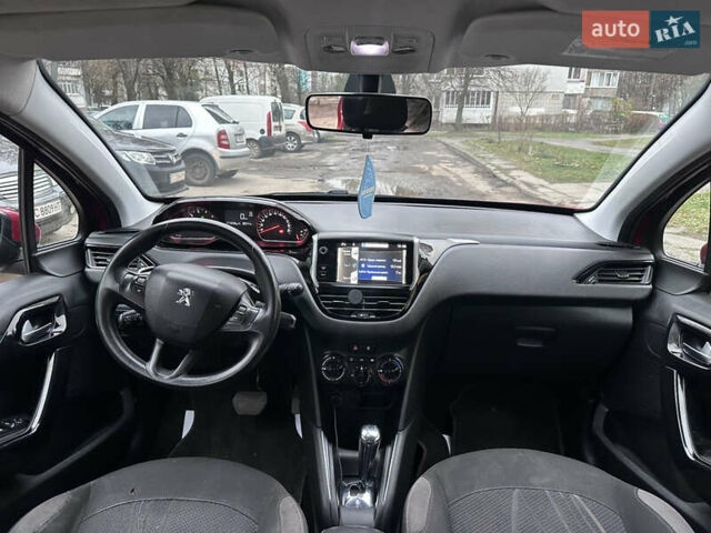 Красный Пежо 208, объемом двигателя 1.2 л и пробегом 177 тыс. км за 5350 $, фото 6 на Automoto.ua