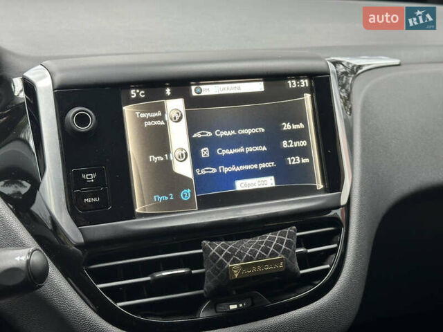 Красный Пежо 208, объемом двигателя 1.6 л и пробегом 232 тыс. км за 7999 $, фото 30 на Automoto.ua