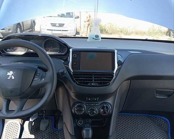 Пежо 208, объемом двигателя 1.2 л и пробегом 204 тыс. км за 6500 $, фото 12 на Automoto.ua