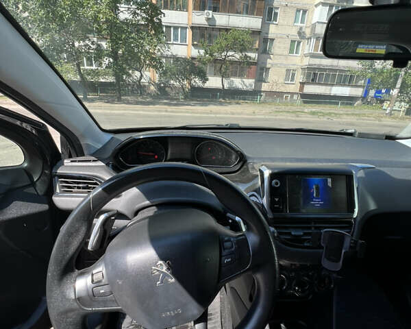 Пежо 208, объемом двигателя 1.2 л и пробегом 129 тыс. км за 7000 $, фото 8 на Automoto.ua