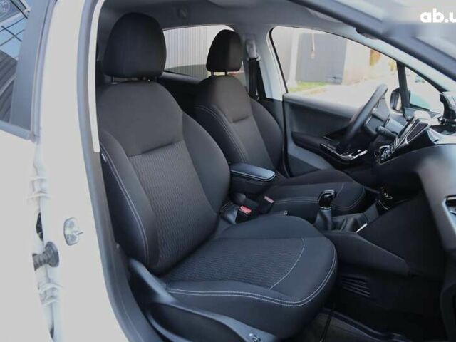 Пежо 208, объемом двигателя 1.5 л и пробегом 55 тыс. км за 12000 $, фото 10 на Automoto.ua