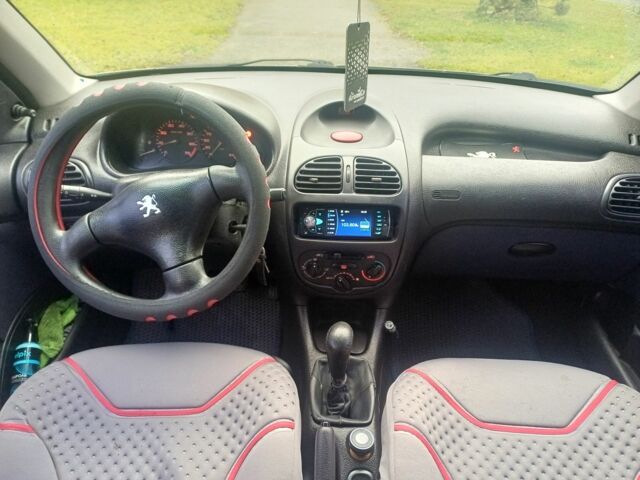 Сірий Пежо 208, об'ємом двигуна 1.4 л та пробігом 230 тис. км за 2349 $, фото 9 на Automoto.ua