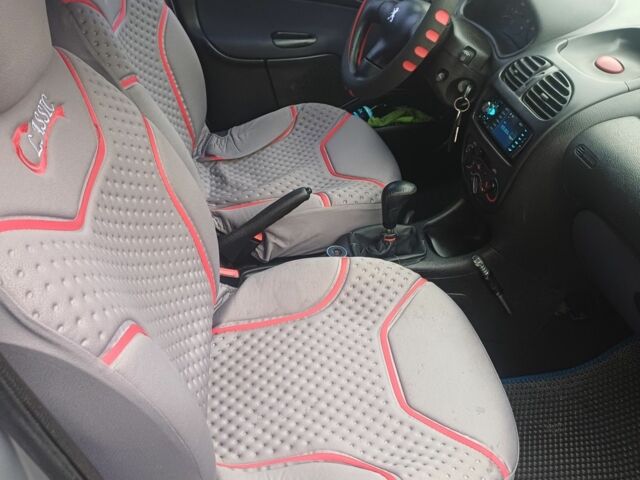 Сірий Пежо 208, об'ємом двигуна 1.4 л та пробігом 230 тис. км за 2349 $, фото 16 на Automoto.ua