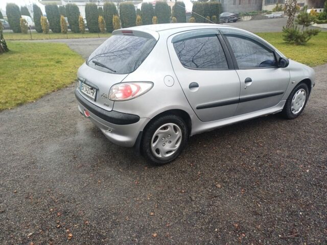 Сірий Пежо 208, об'ємом двигуна 1.4 л та пробігом 230 тис. км за 2349 $, фото 5 на Automoto.ua