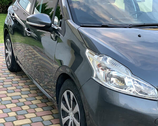 Сірий Пежо 208, об'ємом двигуна 1.4 л та пробігом 230 тис. км за 7300 $, фото 15 на Automoto.ua