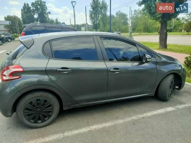 Сірий Пежо 208, об'ємом двигуна 1.4 л та пробігом 251 тис. км за 7000 $, фото 1 на Automoto.ua