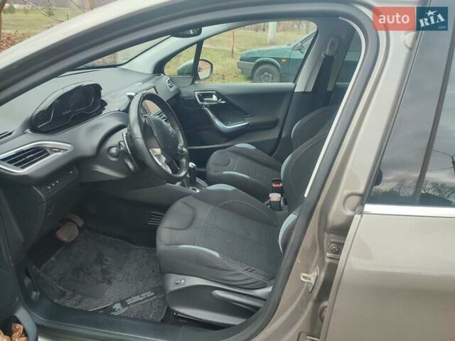 Серый Пежо 208, объемом двигателя 1.57 л и пробегом 190 тыс. км за 7700 $, фото 6 на Automoto.ua