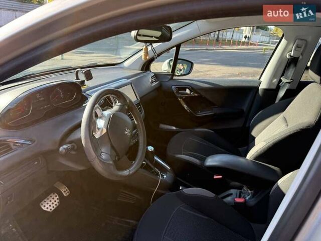 Серый Пежо 208, объемом двигателя 1.6 л и пробегом 131 тыс. км за 8200 $, фото 6 на Automoto.ua
