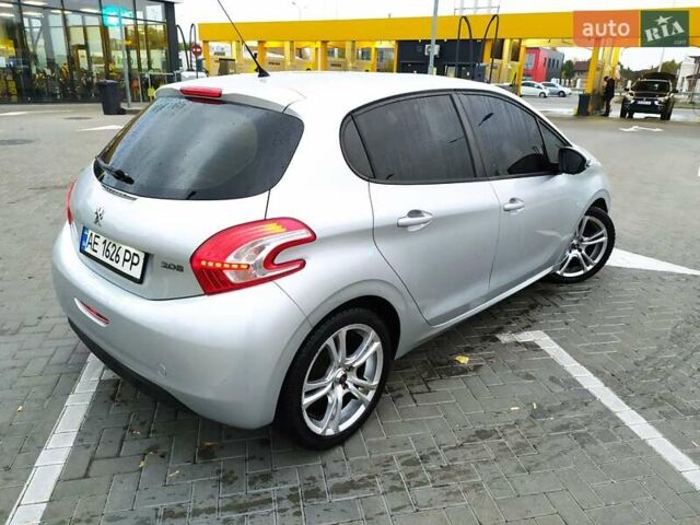 Пежо 208 2013 в Днепре (Днепропетровске) на Automoto.ua Серый Пежо 208, объемом двигателя 1.2 л и пробегом 175 тыс. км за 6200 $, фото 6 на Automoto.ua