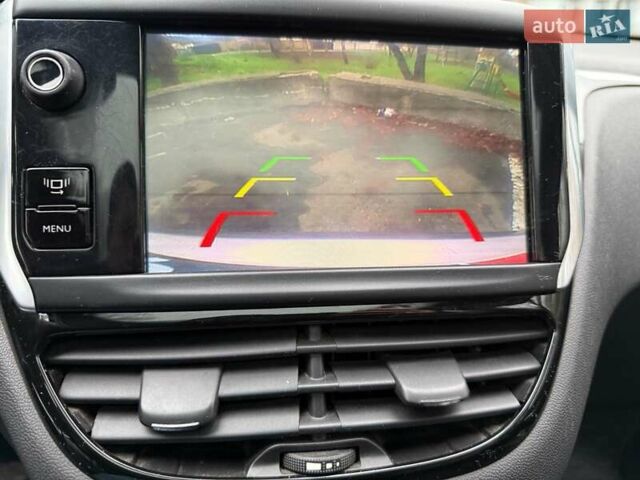 Серый Пежо 208, объемом двигателя 1.6 л и пробегом 136 тыс. км за 6390 $, фото 15 на Automoto.ua