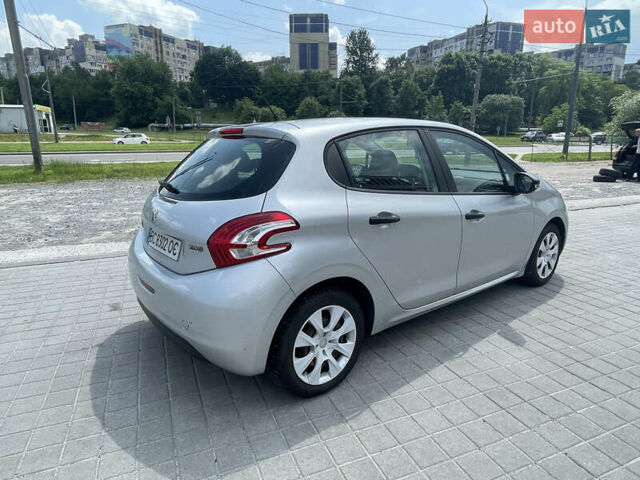 Серый Пежо 208, объемом двигателя 1 л и пробегом 123 тыс. км за 4400 $, фото 5 на Automoto.ua
