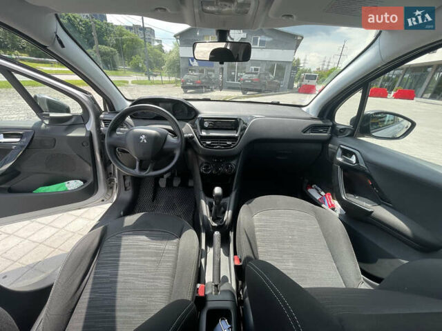 Серый Пежо 208, объемом двигателя 1 л и пробегом 123 тыс. км за 4400 $, фото 10 на Automoto.ua