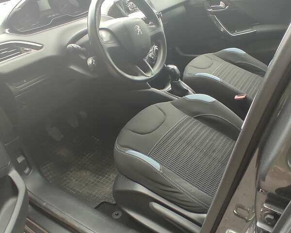 Серый Пежо 208, объемом двигателя 1.4 л и пробегом 226 тыс. км за 5400 $, фото 1 на Automoto.ua