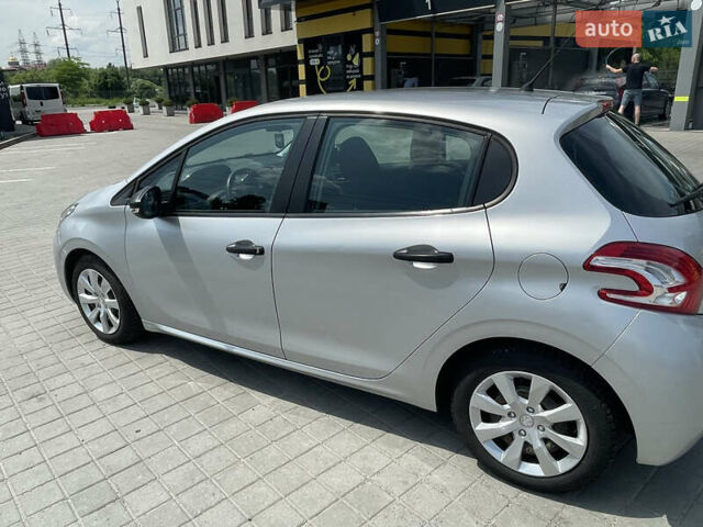 Серый Пежо 208, объемом двигателя 1 л и пробегом 123 тыс. км за 4400 $, фото 8 на Automoto.ua