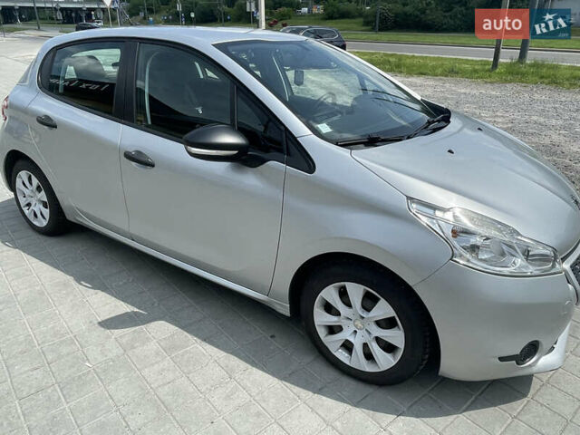 Серый Пежо 208, объемом двигателя 1 л и пробегом 123 тыс. км за 4400 $, фото 3 на Automoto.ua