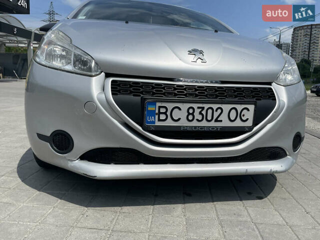 Серый Пежо 208, объемом двигателя 1 л и пробегом 123 тыс. км за 4400 $, фото 2 на Automoto.ua