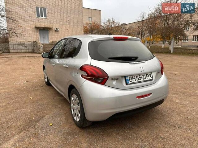 Серый Пежо 208, объемом двигателя 1.2 л и пробегом 172 тыс. км за 8700 $, фото 2 на Automoto.ua