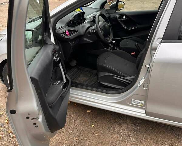 Серый Пежо 208, объемом двигателя 1.2 л и пробегом 172 тыс. км за 8700 $, фото 13 на Automoto.ua