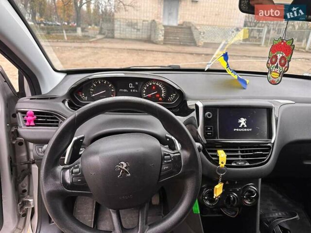 Серый Пежо 208, объемом двигателя 1.2 л и пробегом 172 тыс. км за 8700 $, фото 27 на Automoto.ua