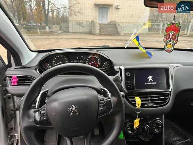 Серый Пежо 208, объемом двигателя 1.2 л и пробегом 172 тыс. км за 8700 $, фото 25 на Automoto.ua