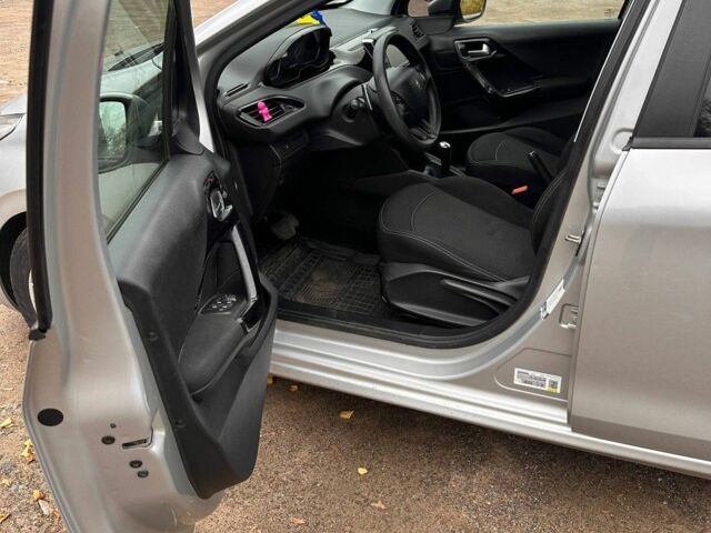 Серый Пежо 208, объемом двигателя 1.2 л и пробегом 172 тыс. км за 8700 $, фото 6 на Automoto.ua